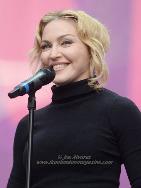 Madonna speaks on stage at "Sound Of Change" at Twickenham Stadium. © Joe Alvarez