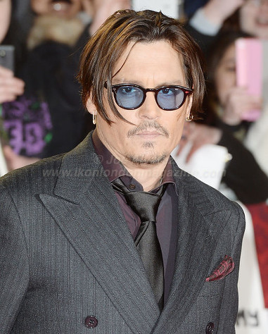 Johnny Depp attends the premiere of "Mortdecai" at Empire, Leicester Square © Joe Alvarez